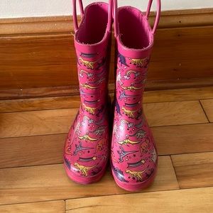 Pink dinosaur rain boots
